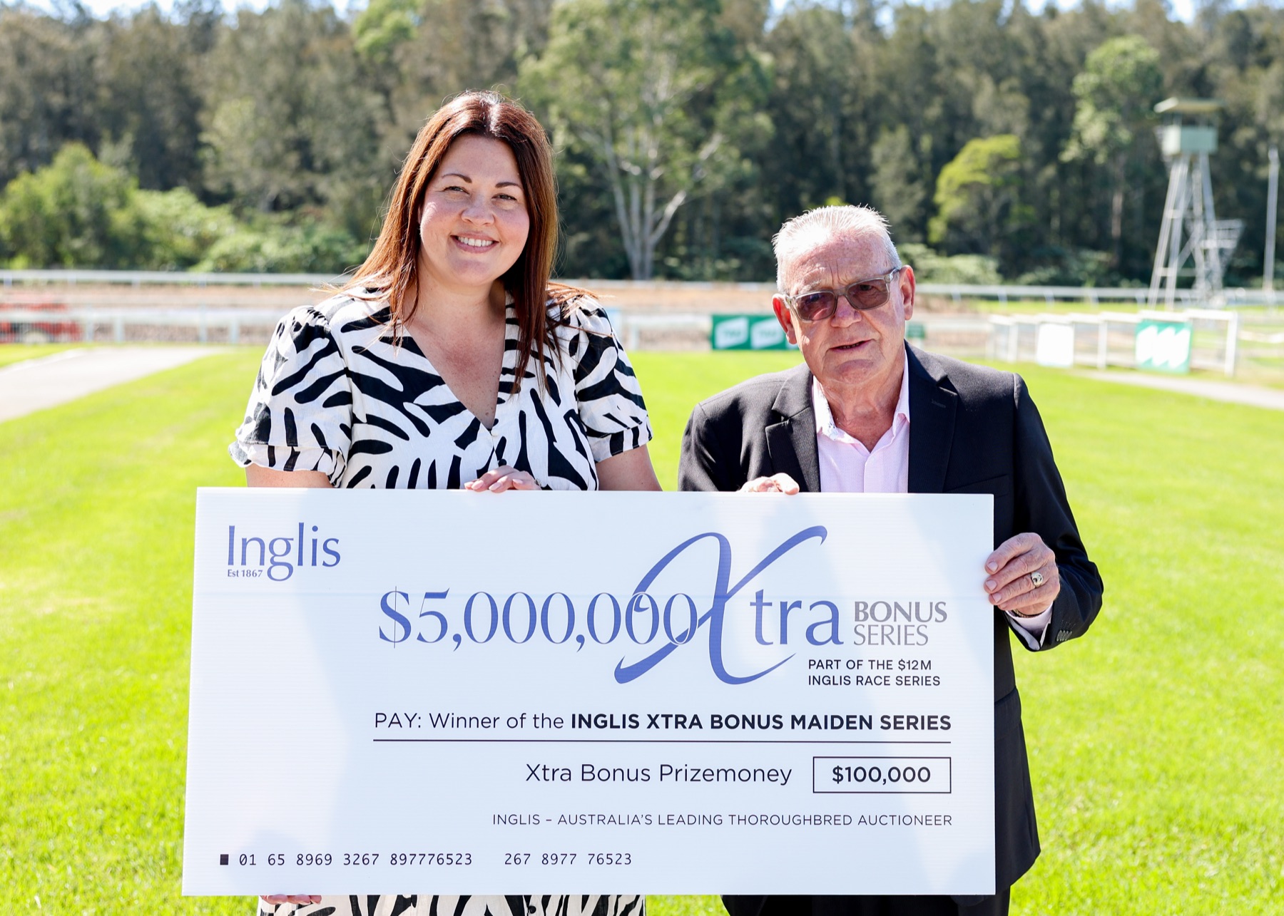 Owners receiving the winning cheque